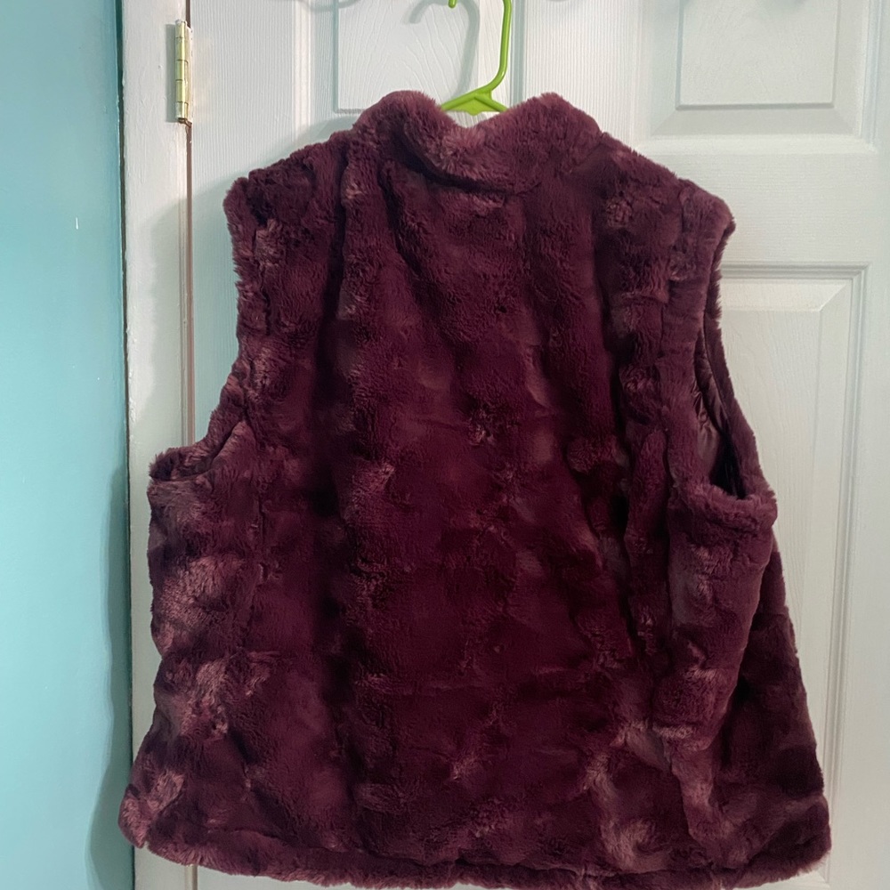 Women’s reversible vest, dark purple, never used.